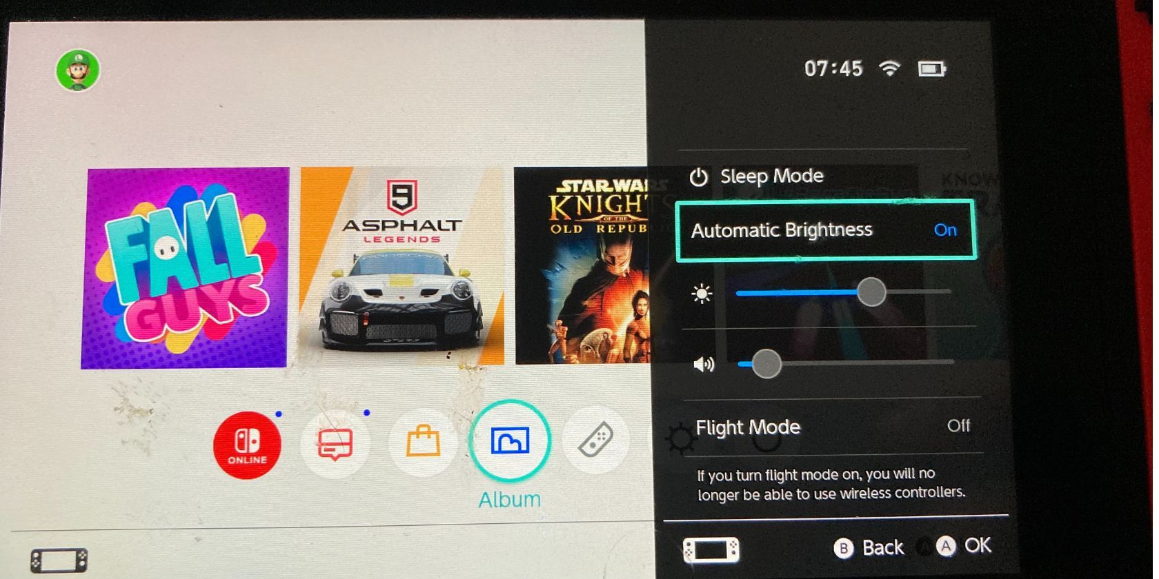  photo of the Nintendo Switch with a quick settings menu open