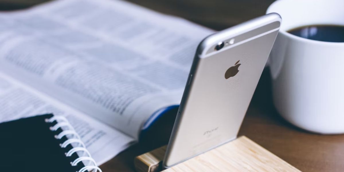 silver iphone 6 on phone stand 