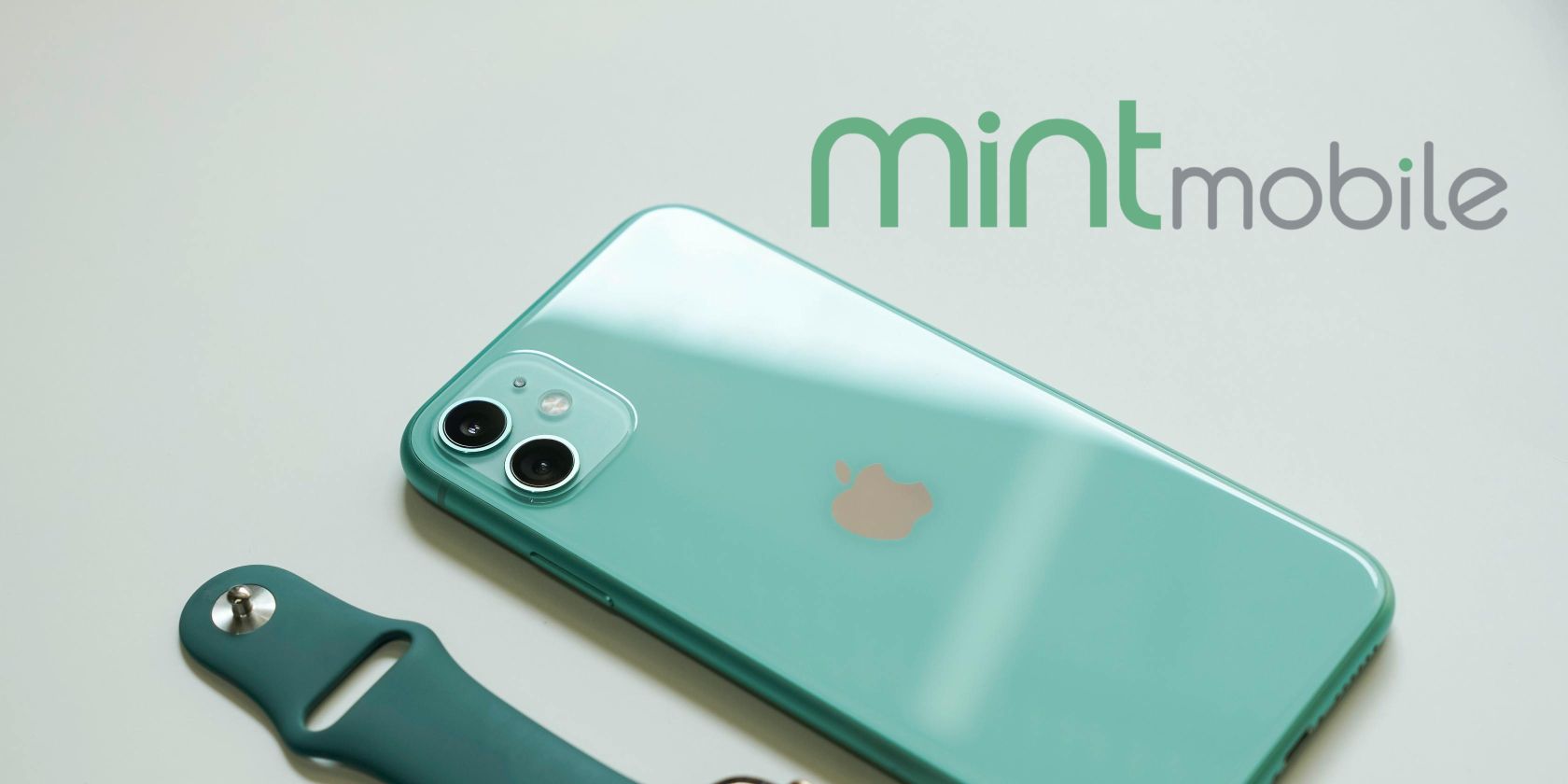 iPhone next to an Apple Watch with Mint Mobile logo