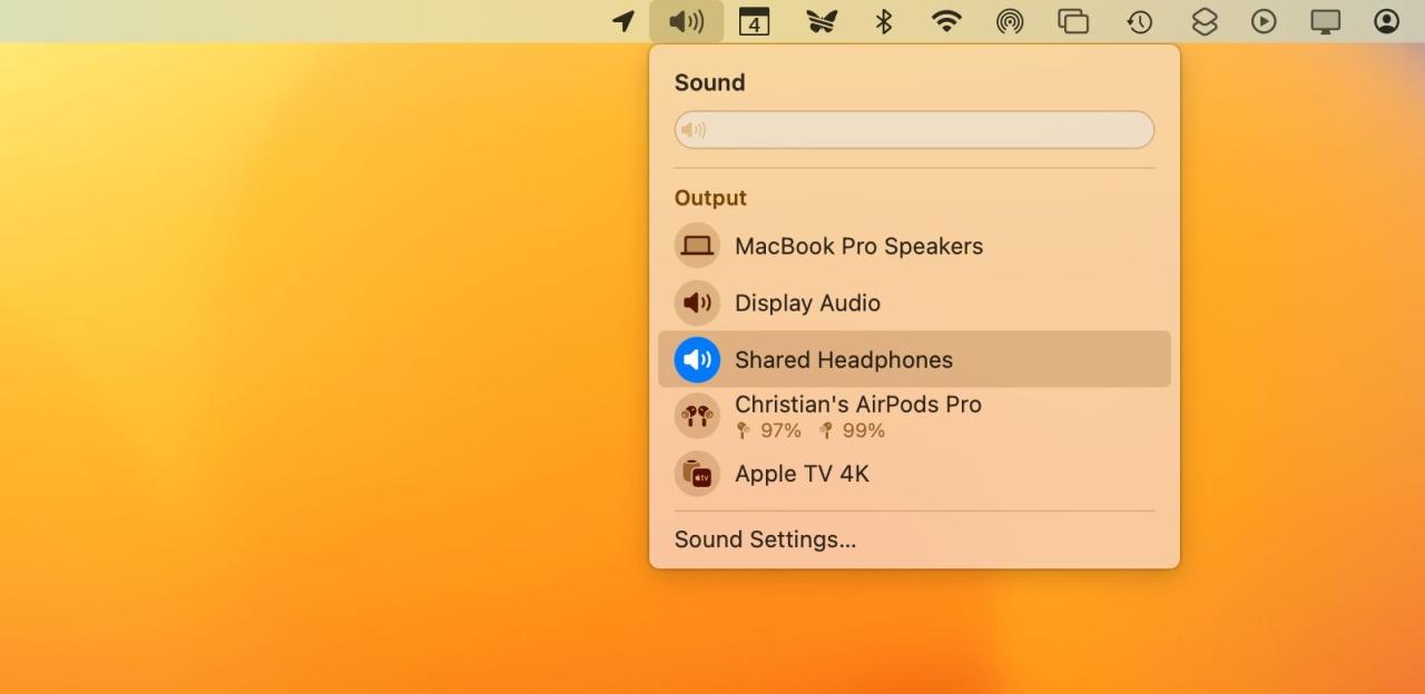 The volume menu in the macOS menu bar, with the default audio output set to two sets of shared headphones