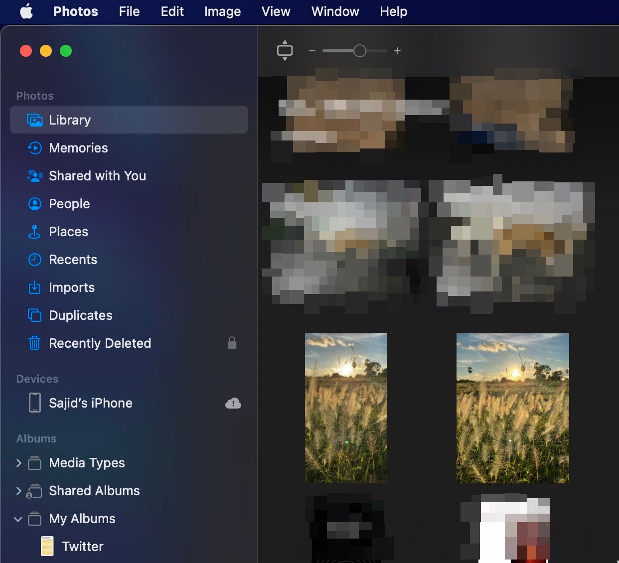 Sidebar of Photos app on Mac with iPhone under Devices section