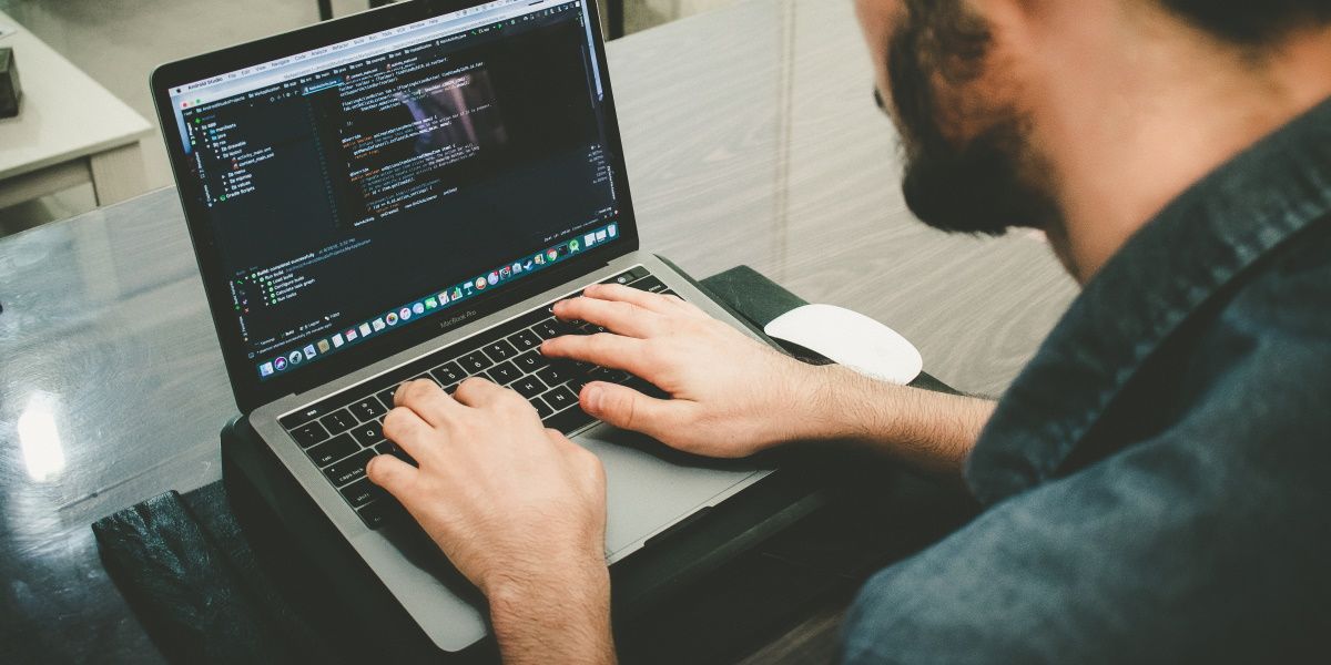 A person typing commands on a laptop