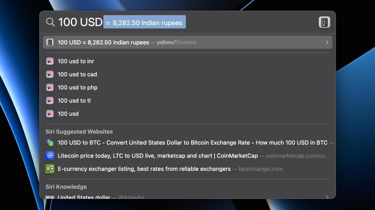 100 USD converted to INR value in Spotlight on macOS