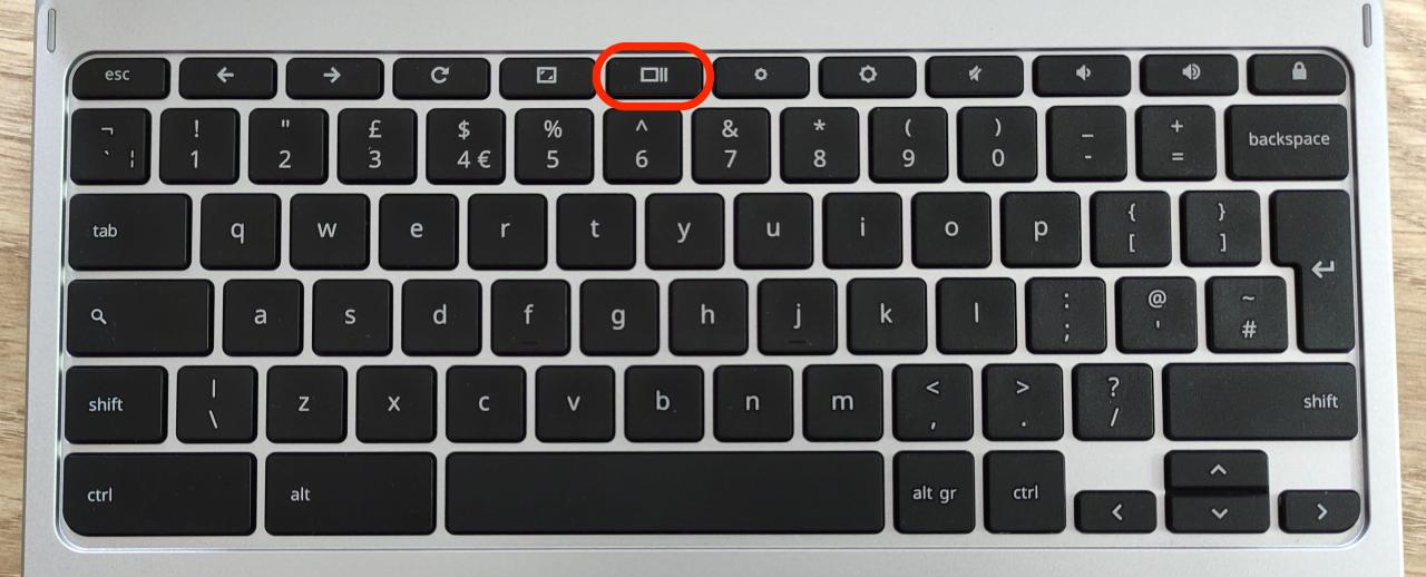 Chromebook keyboard with Show All Windows Key highlighted