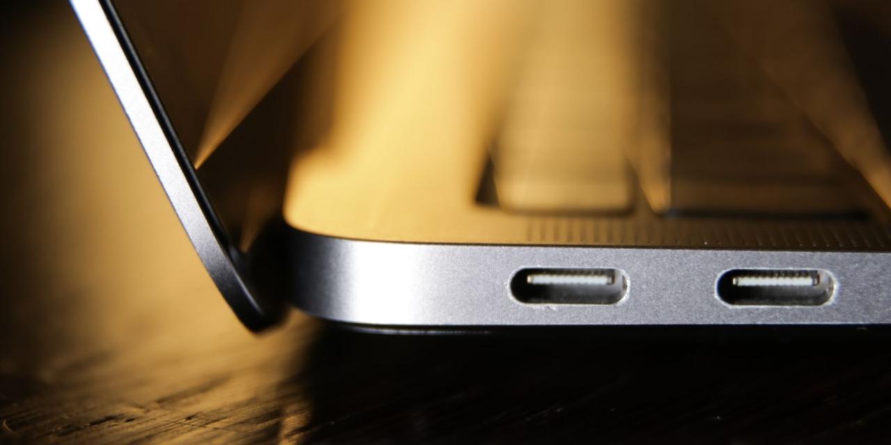 close-up of a MacBook\'s USB ports