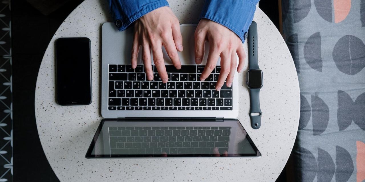 Aerial shot of man using a mac