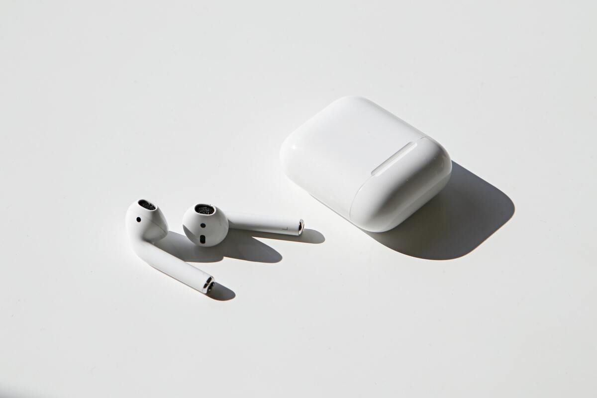 AirPods on white surface