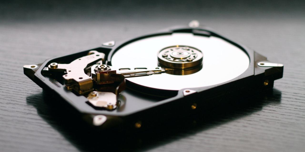 Black internal HDD on a black surface