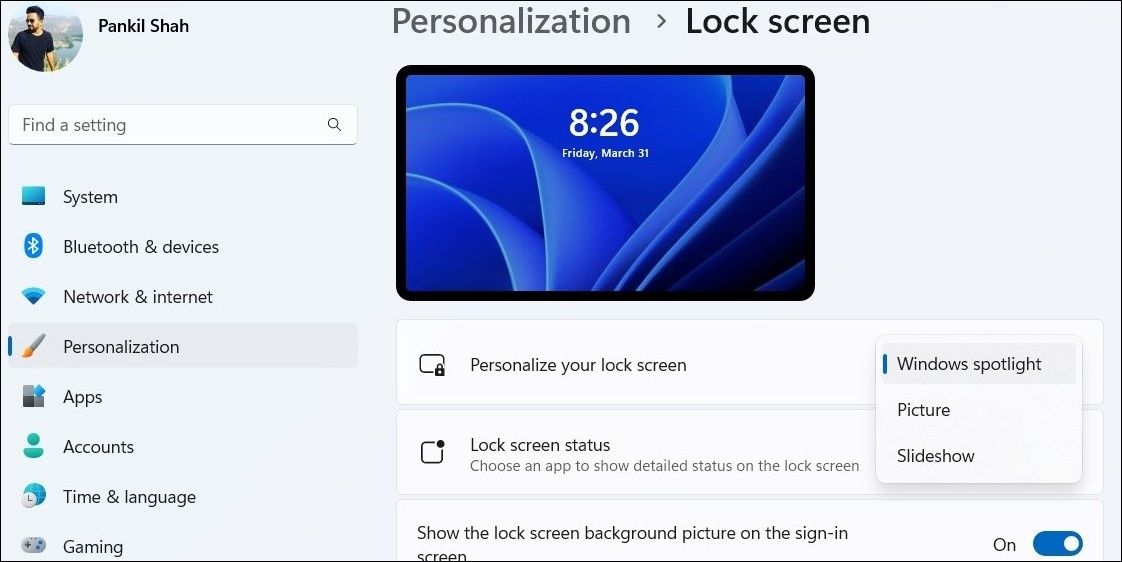 Enable or Disable Spotlight Images on Lock Screen Using Settings App