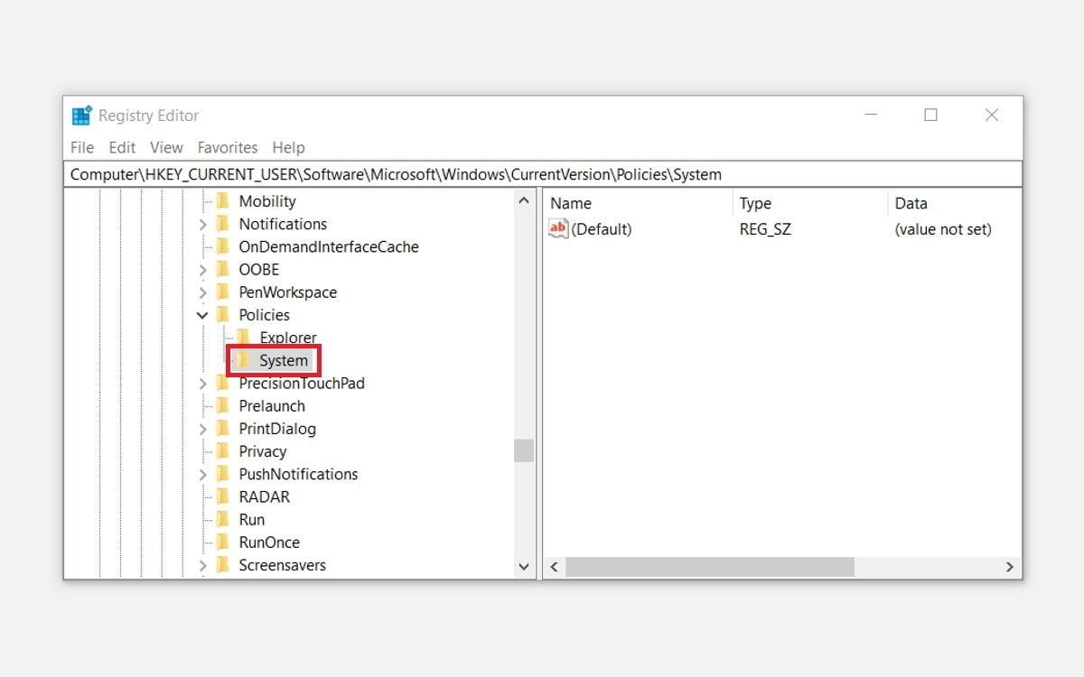 Navigating to the System key in the Registry Editor